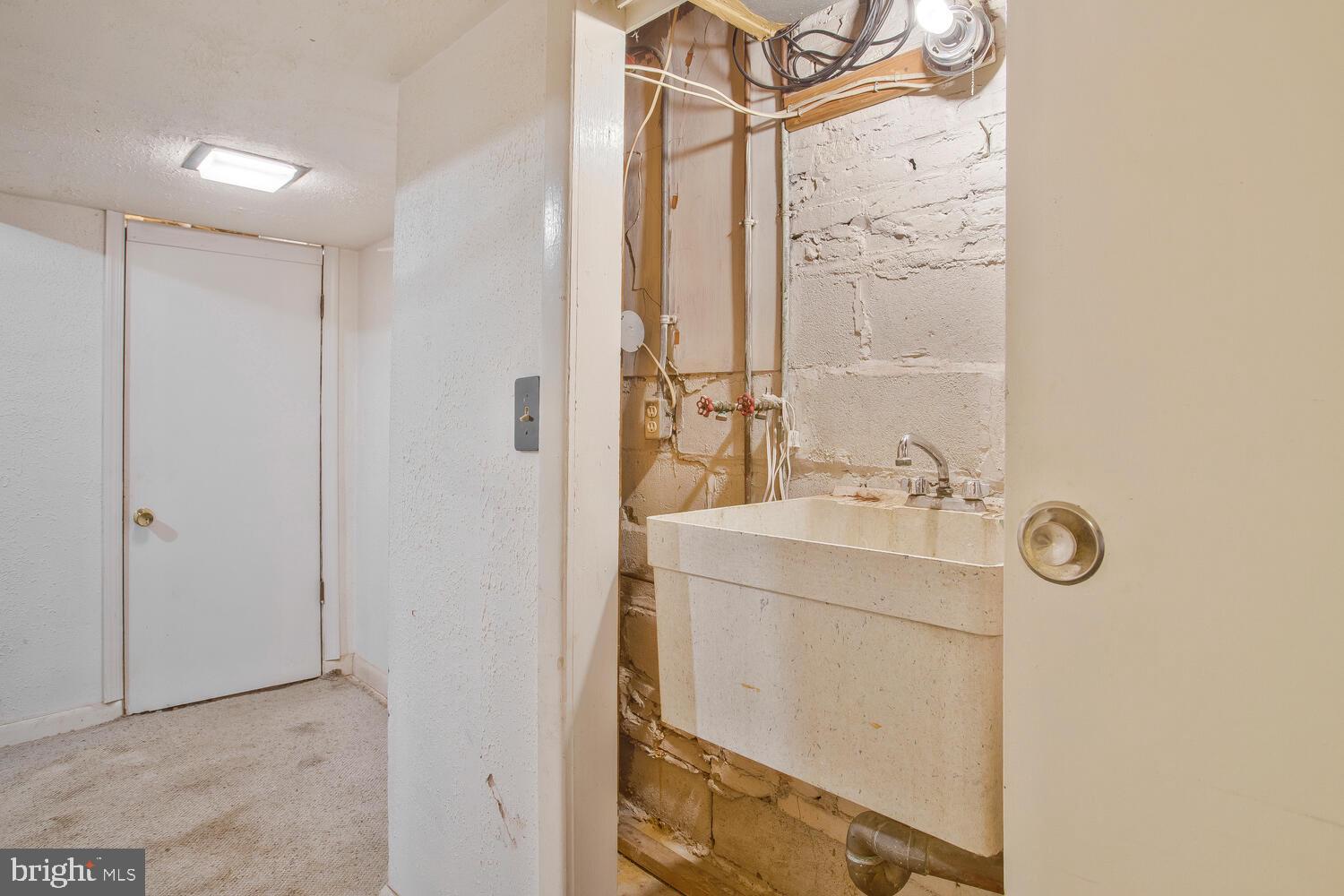 1148 Roland Heights Avenue Baltimore, MD 21211 - Photo 30 of 38 Utility sink in lower level
