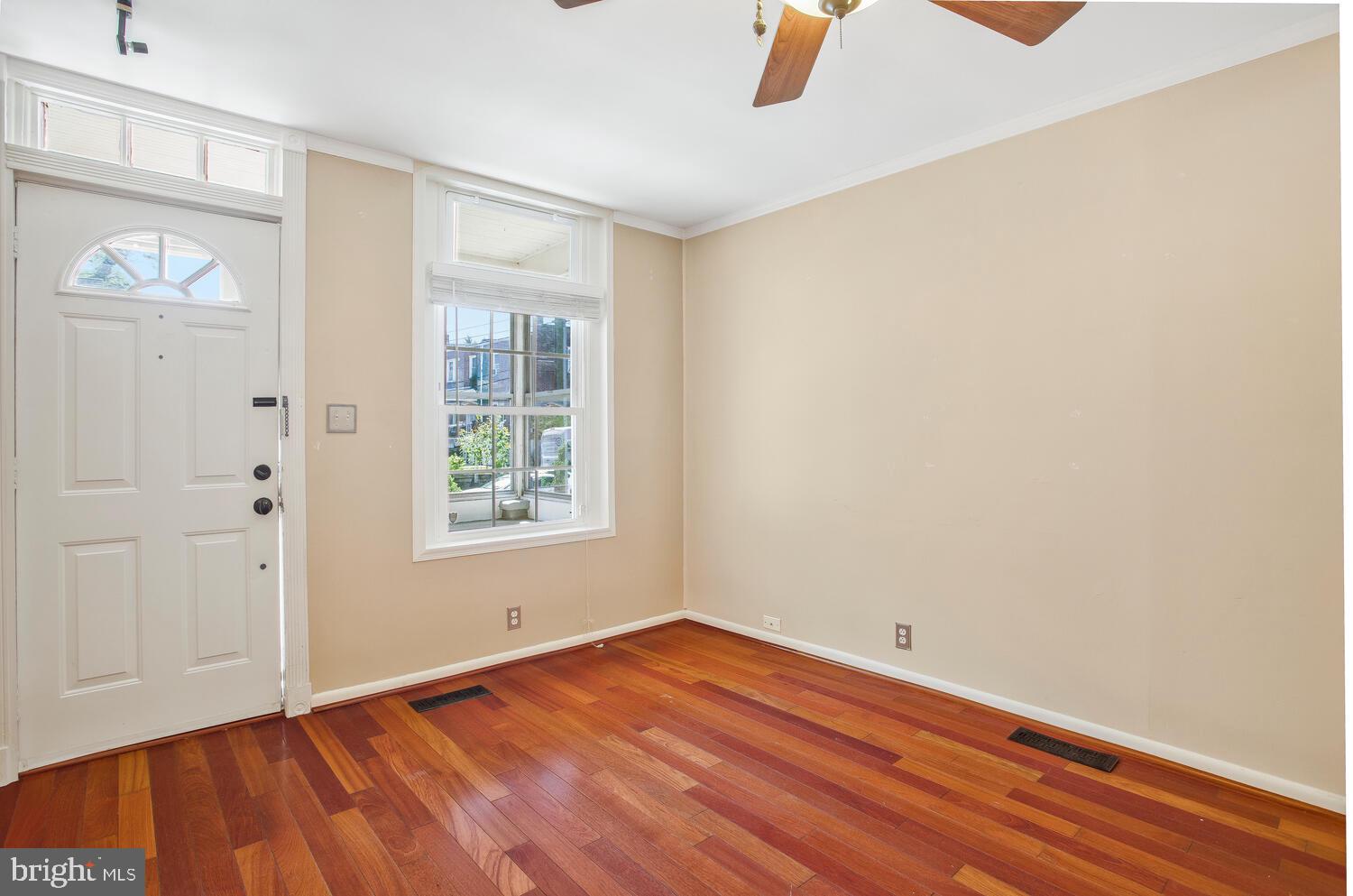 1148 Roland Heights Avenue Baltimore, MD 21211 - Photo 10 of 38 Great natural light in living room