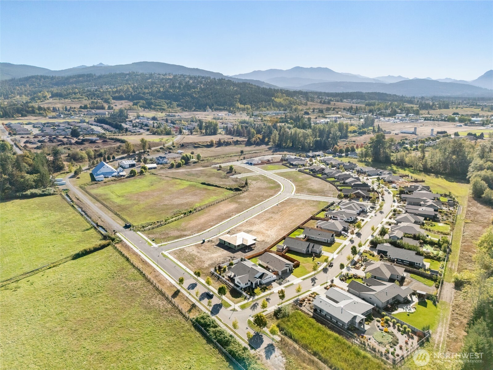 70 Dover Lane Sequim, WA 98382 - Photo 20 of 21 an aerial view of residential houses with outdoor space
