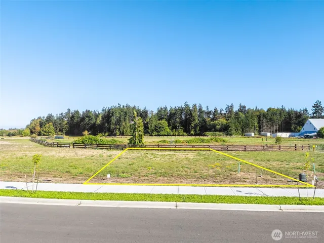 a view of a swimming pool and an outdoor space