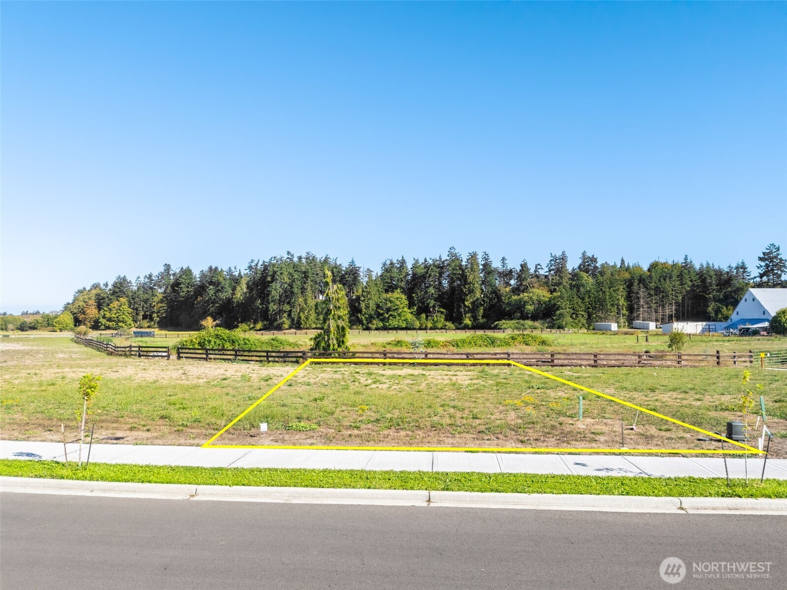 70 Dover Lane Sequim, WA 98382 - Photo 2 of 21 a view of a swimming pool and an outdoor space