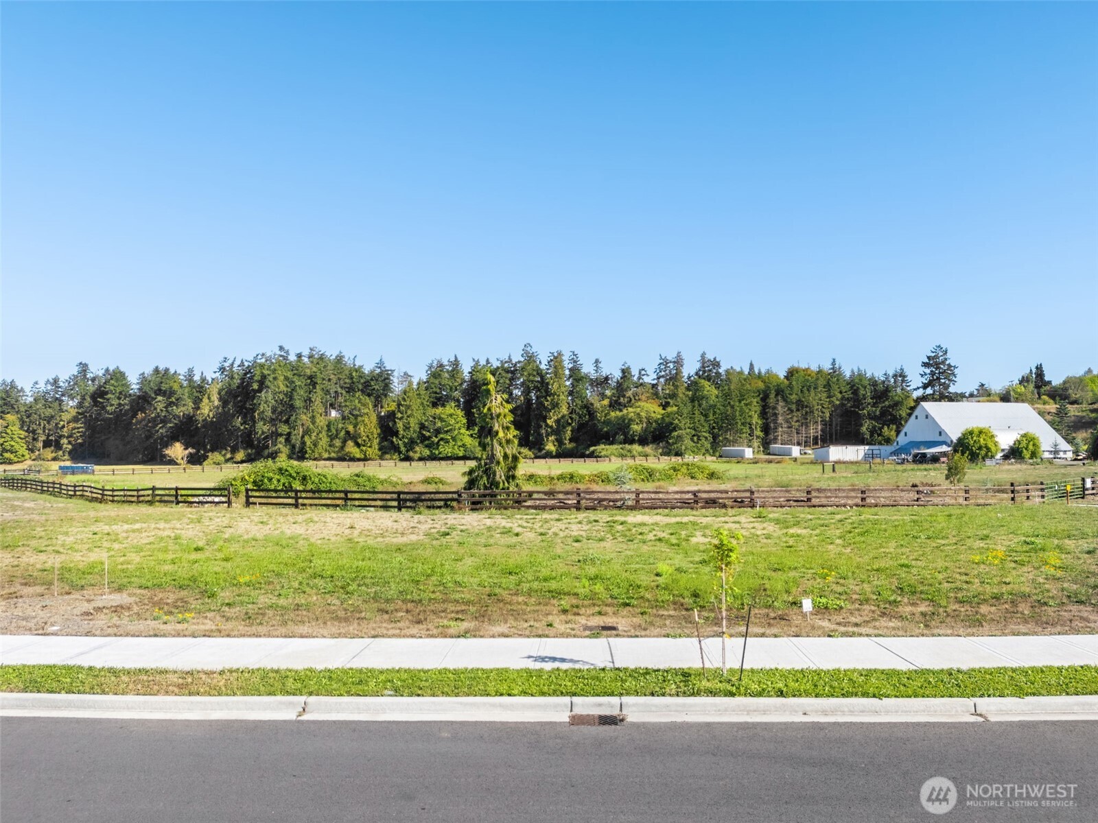 70 Dover Lane Sequim, WA 98382 - Photo 5 of 21 a view of a big yard with an outdoor space
