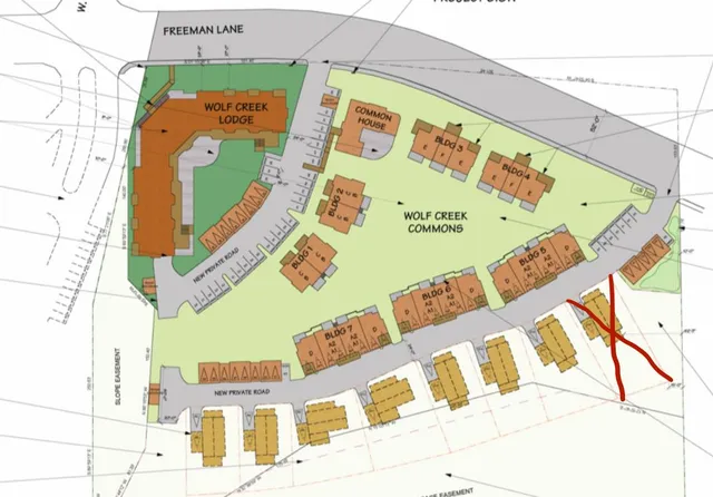 a view of swimming pool with a yard