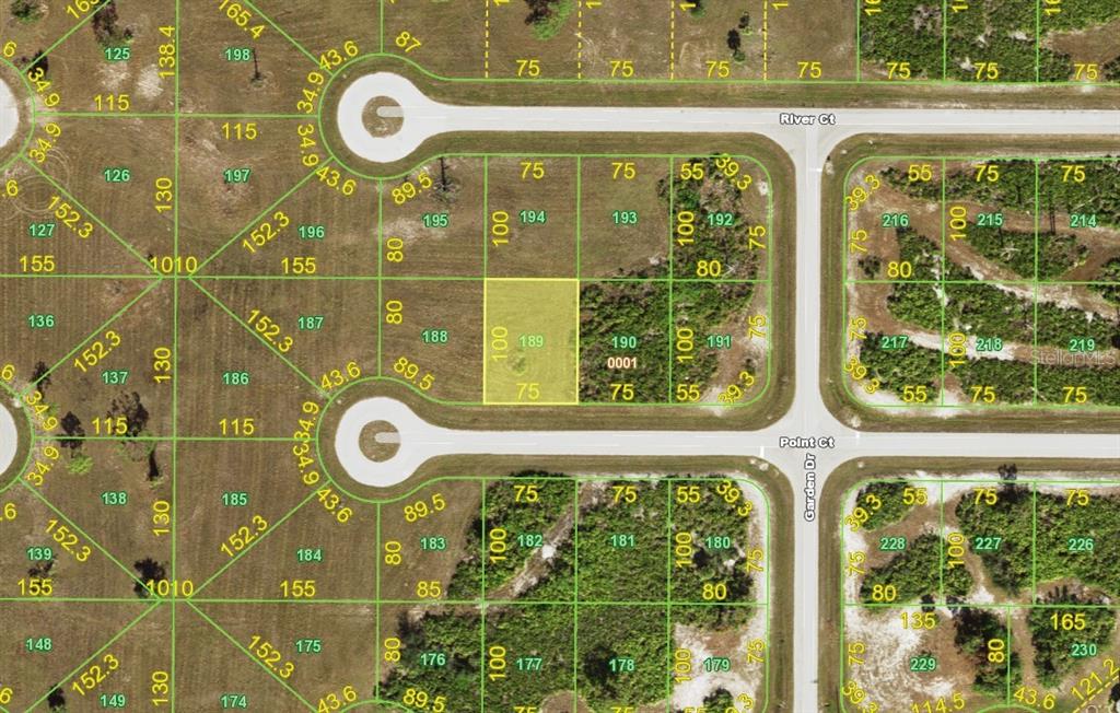 a bathroom with a window and a shower