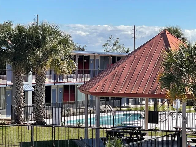 a front view of a house with swimming pool