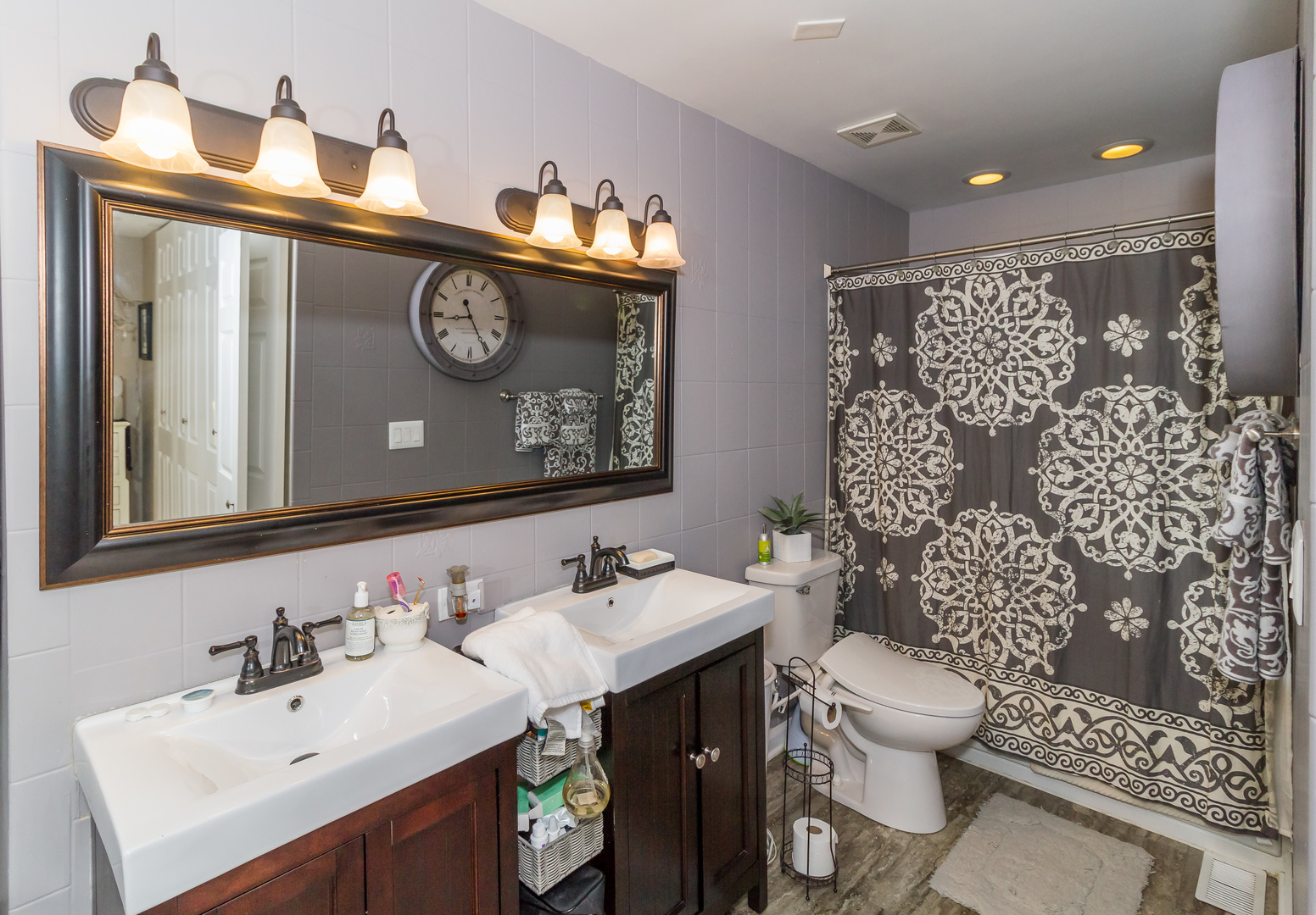 33 Oakview Road Matteson, IL 60443 - Photo 14 of 31 a bathroom with a sink mirror vanity and toilet