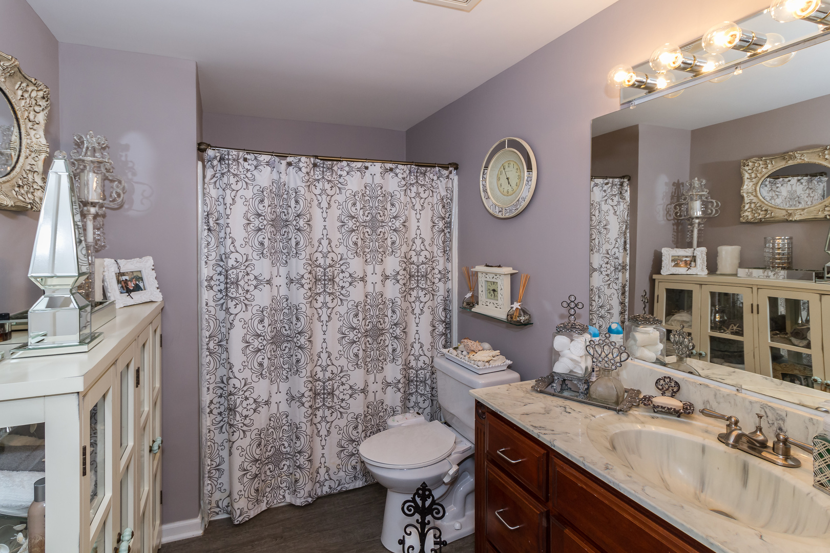 33 Oakview Road Matteson, IL 60443 - Photo 22 of 31 a bathroom with a granite countertop toilet sink and mirror