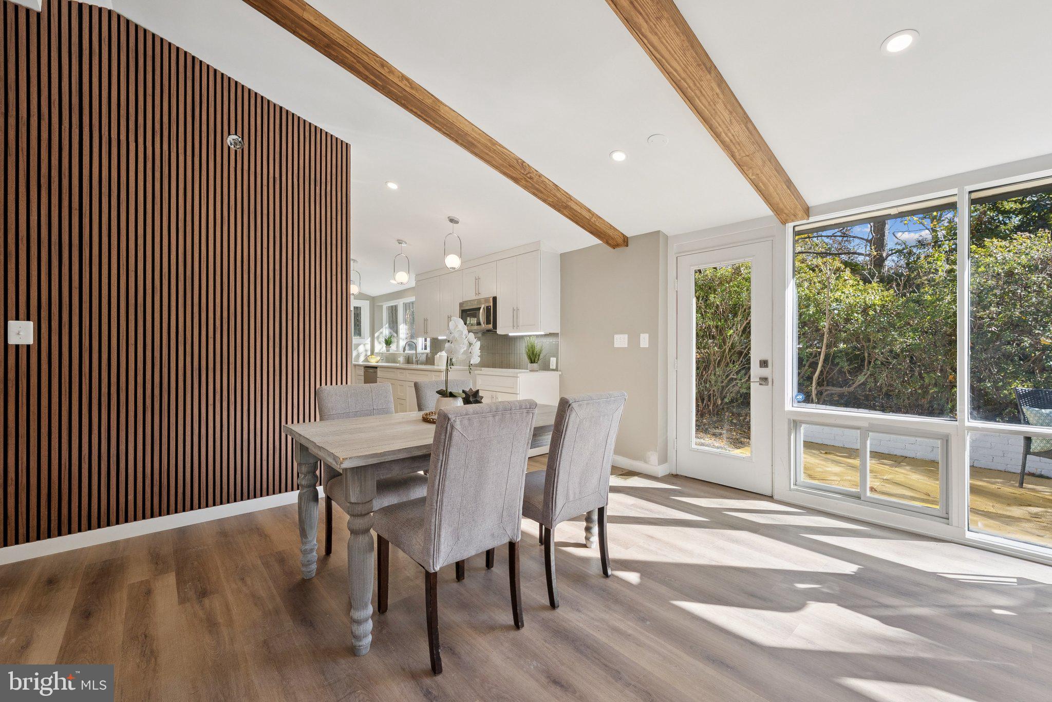 11511 Highview Avenue Silver Spring, MD 20902 - Photo 13 of 39 a dining room with furniture and wooden floor