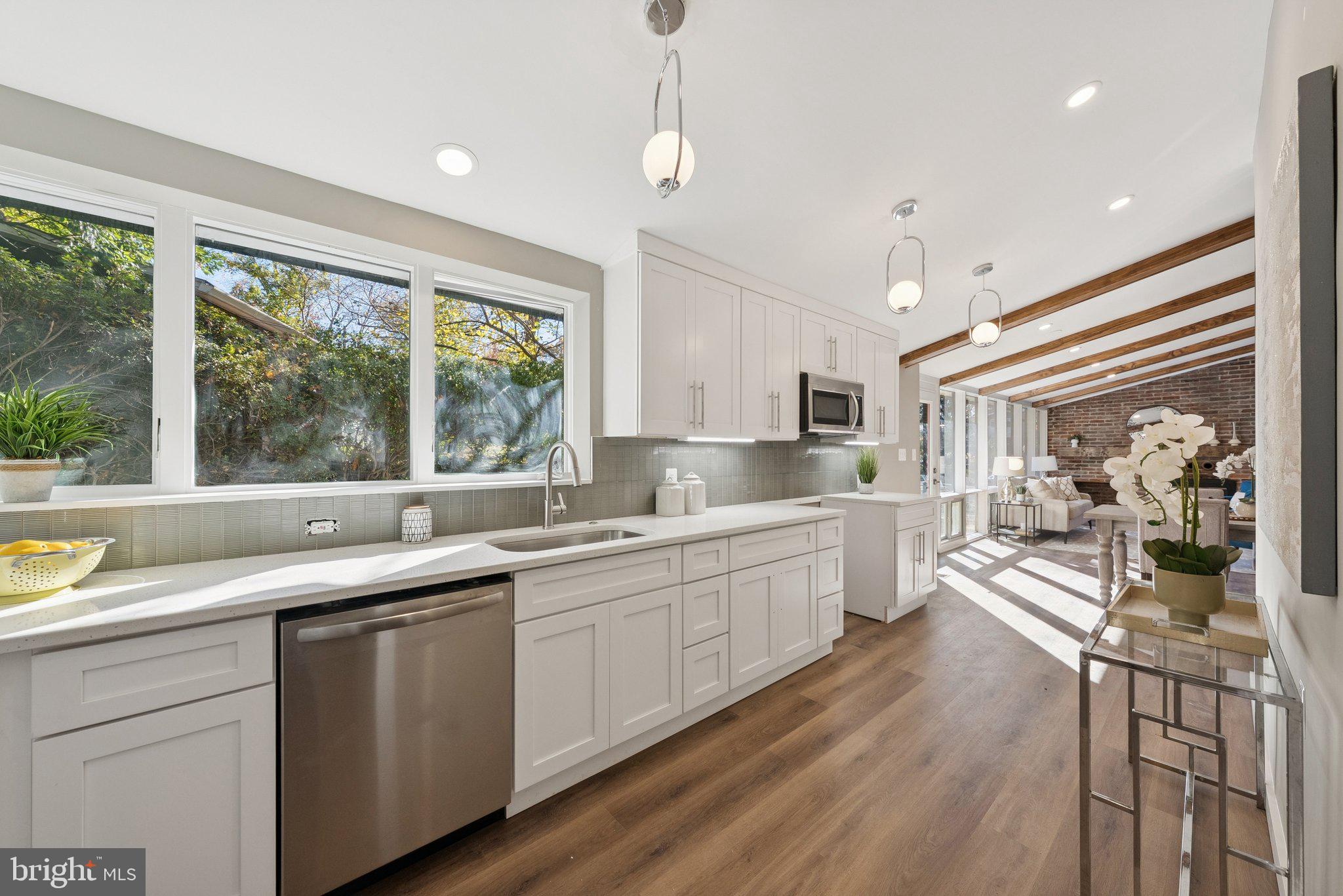 11511 Highview Avenue Silver Spring, MD 20902 - Photo 18 of 39 a kitchen with lots of counter top space and wooden floor