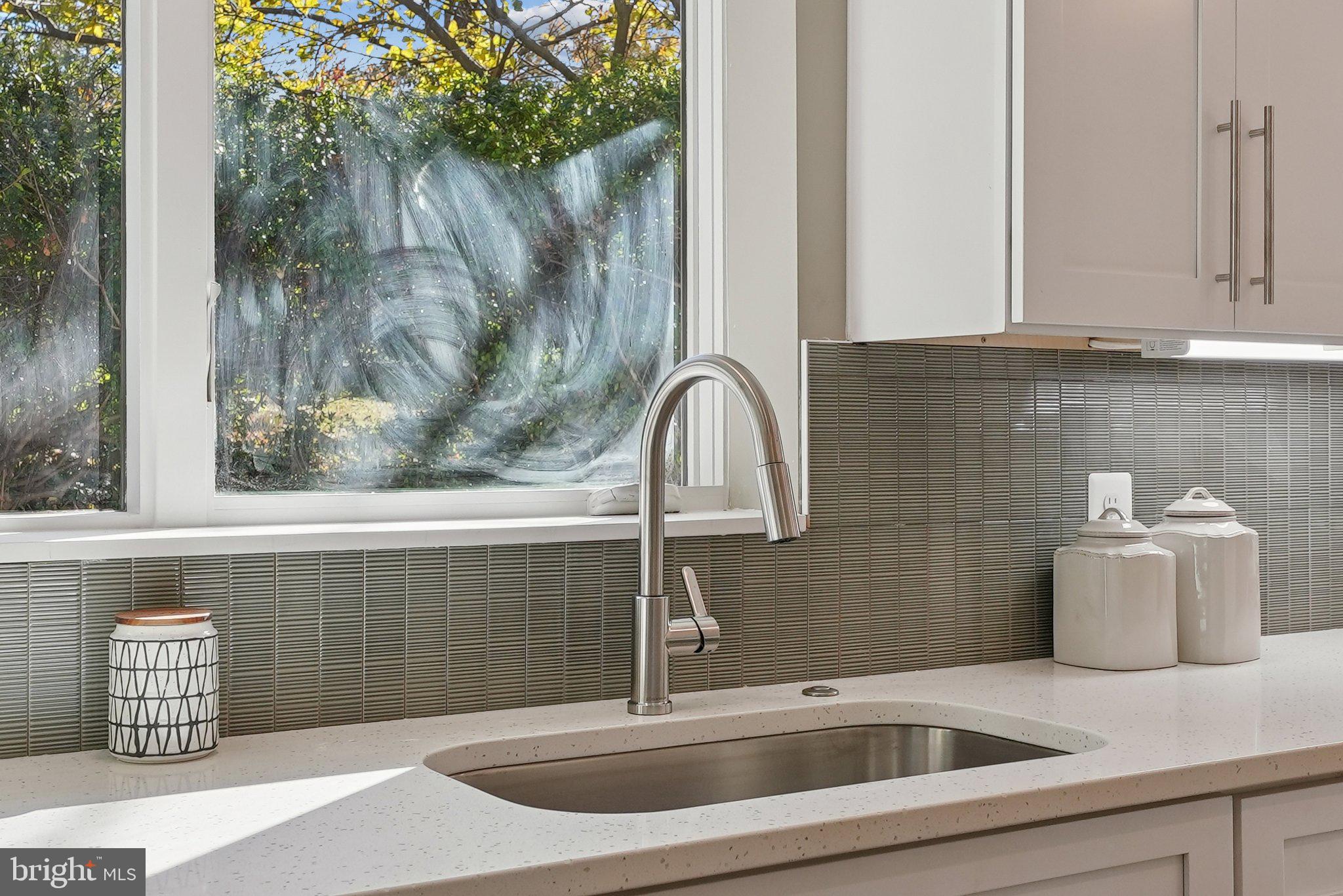 11511 Highview Avenue Silver Spring, MD 20902 - Photo 19 of 39 a kitchen with a sink and granite top