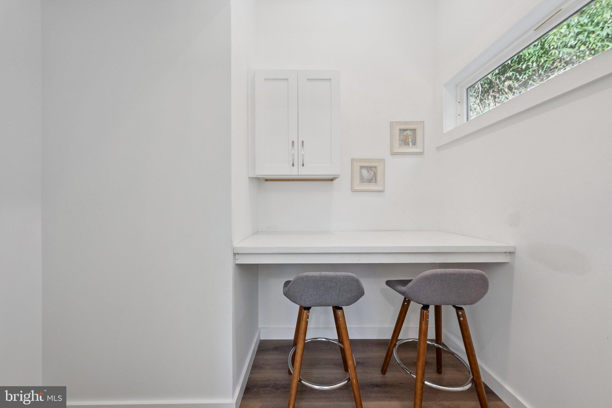 11511 Highview Avenue Silver Spring, MD 20902 - Photo 21 of 39 a view of table and chair in the kitchen