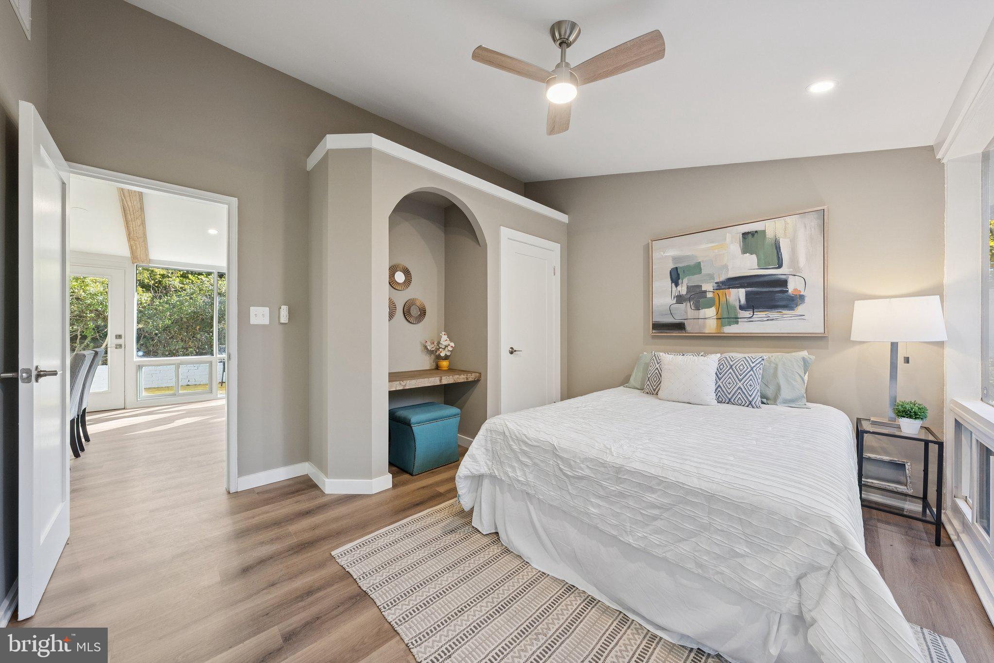 11511 Highview Avenue Silver Spring, MD 20902 - Photo 30 of 39 a bedroom with a large bed and a large window