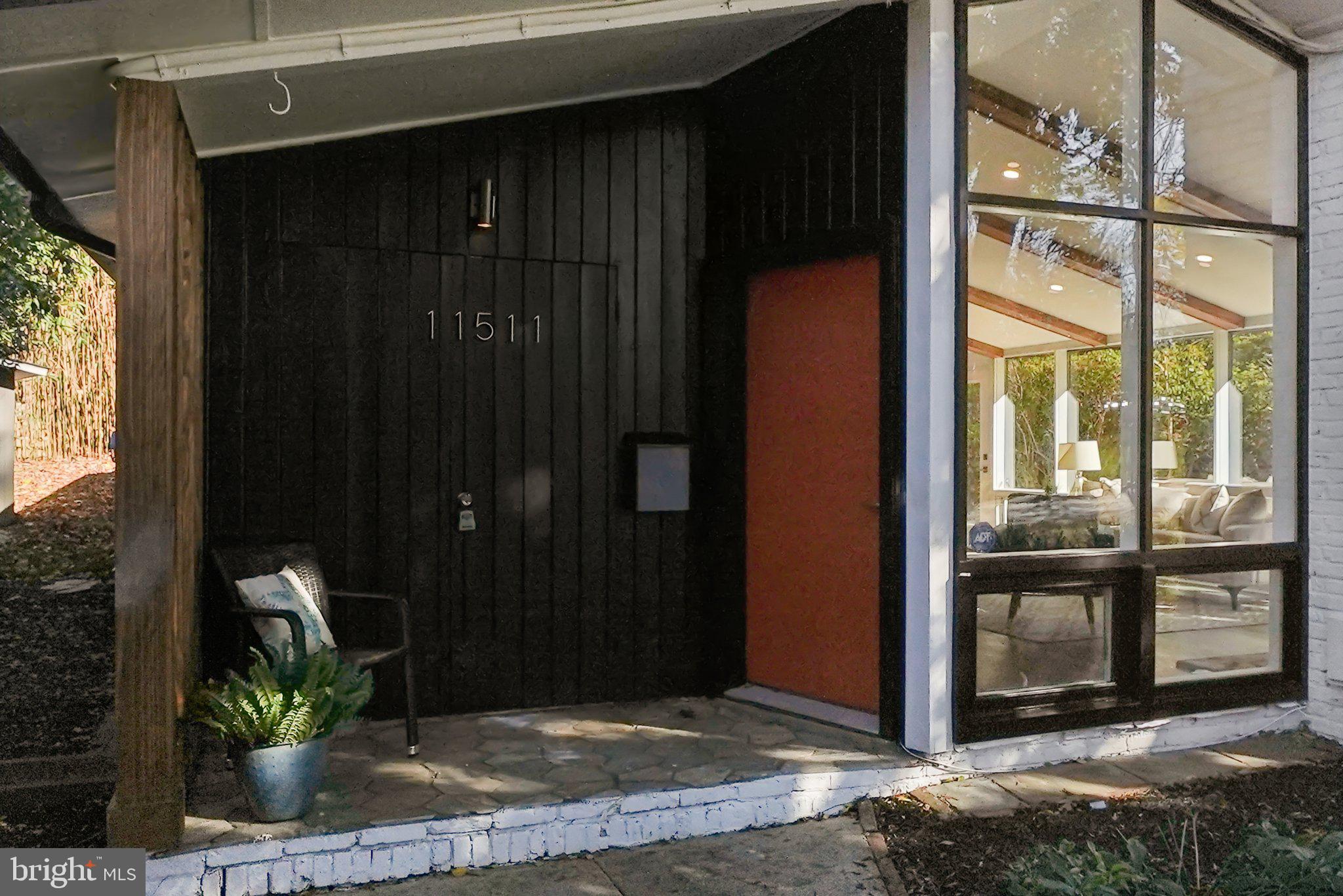 11511 Highview Avenue Silver Spring, MD 20902 - Photo 3 of 39 a front view of a house with a porch