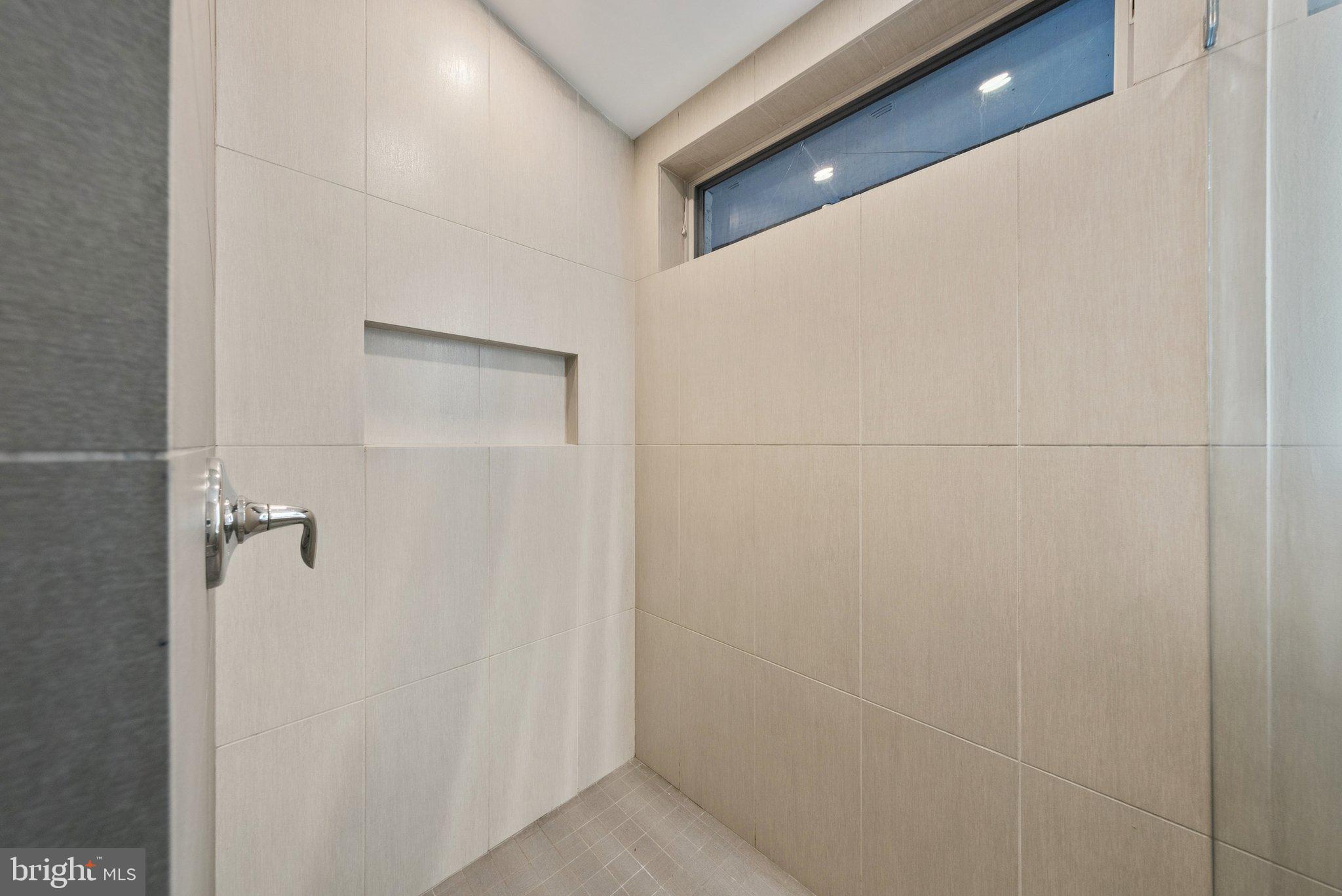 11511 Highview Avenue Silver Spring, MD 20902 - Photo 33 of 39 a close view of shower tap