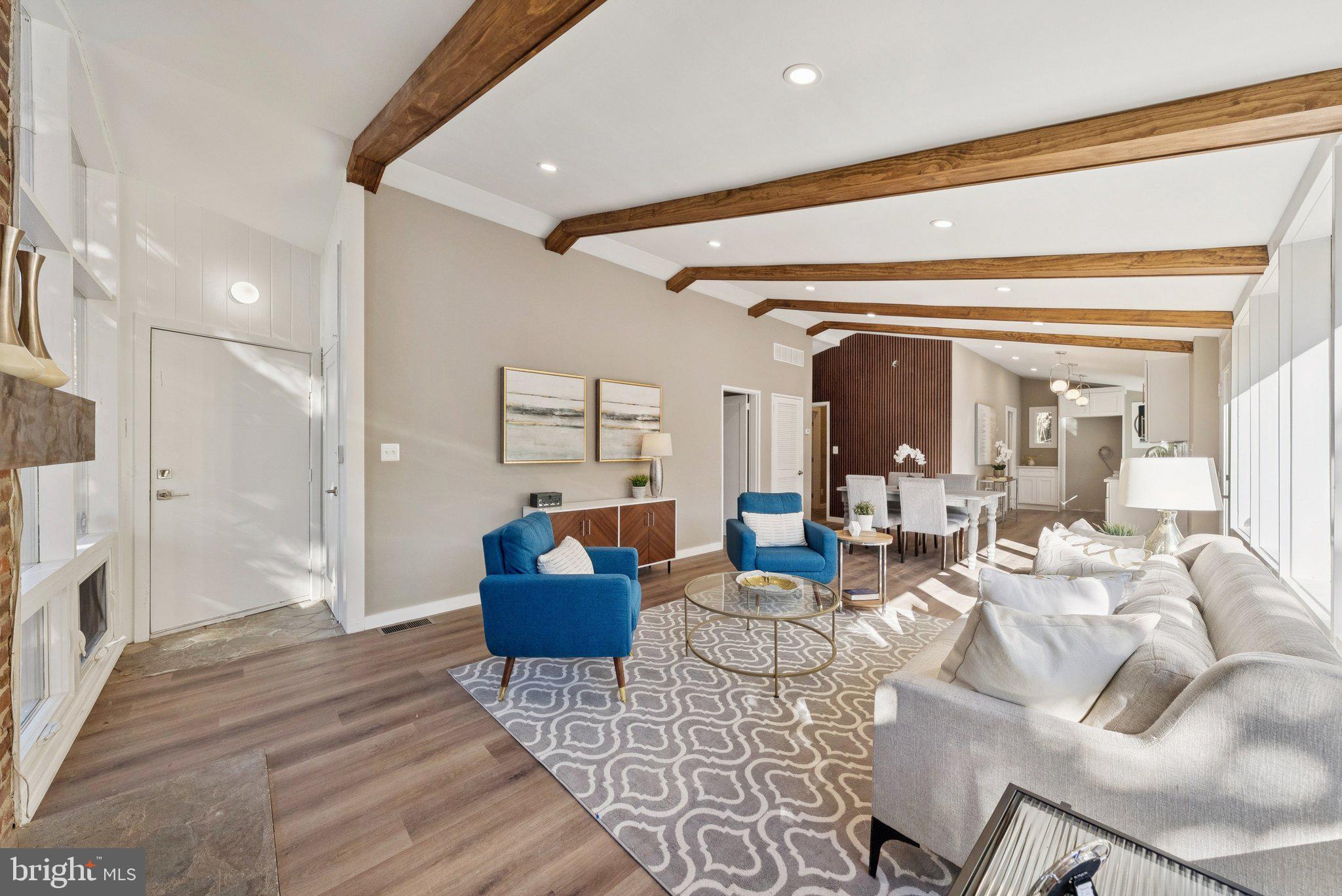 11511 Highview Avenue Silver Spring, MD 20902 - Photo 4 of 39 a living room with furniture and a fireplace