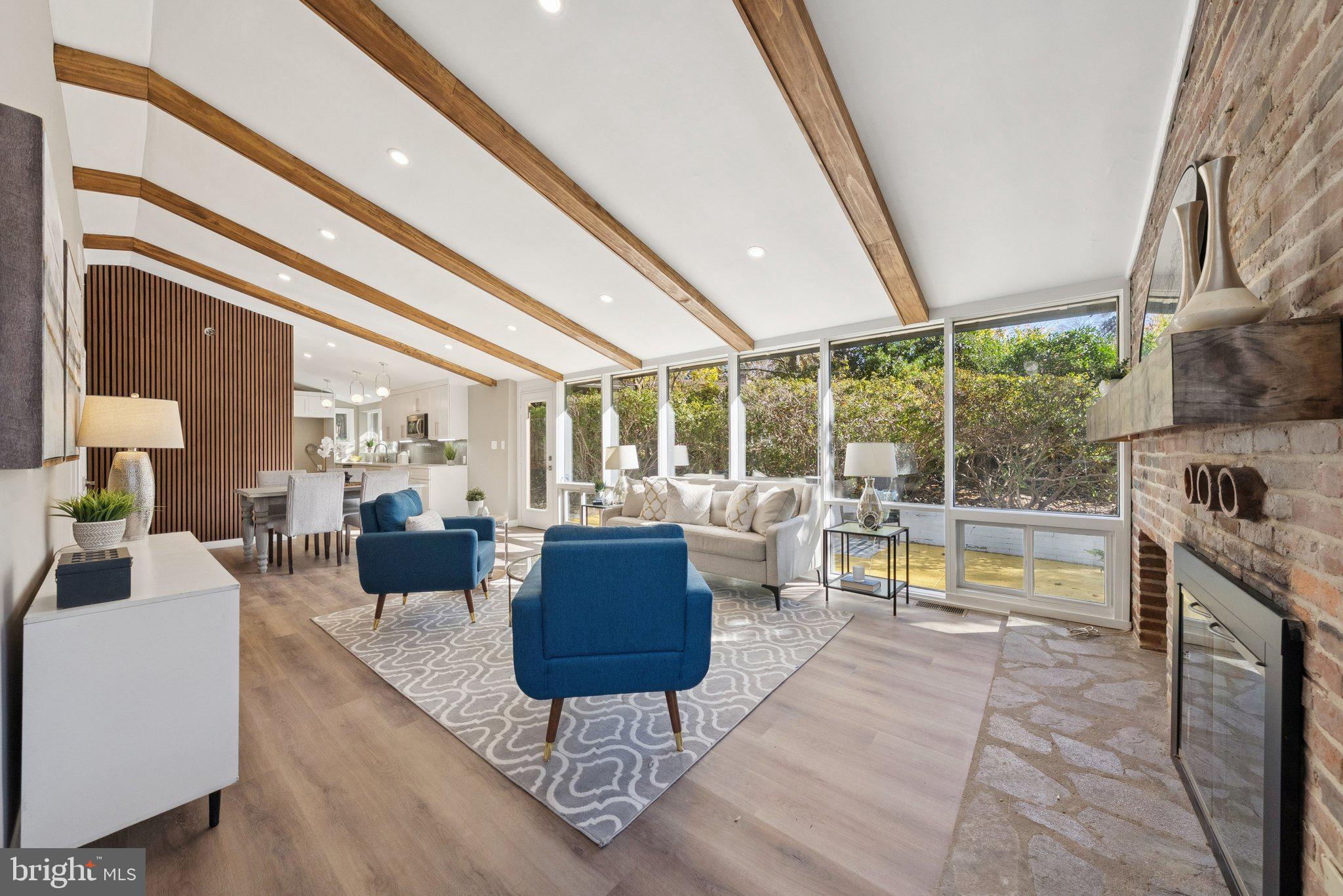 11511 Highview Avenue Silver Spring, MD 20902 - Photo 5 of 39 a living room with furniture and a large window