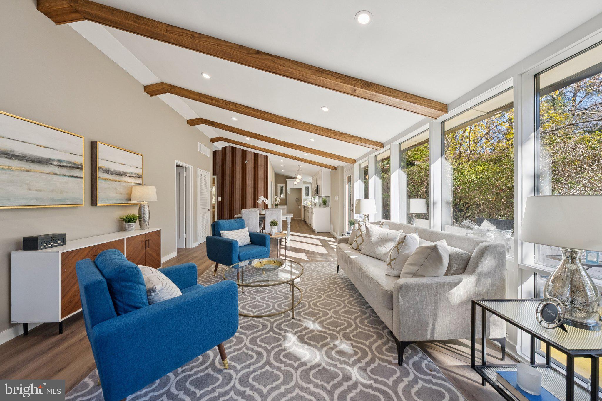 11511 Highview Avenue Silver Spring, MD 20902 - Photo 6 of 39 a living room with furniture and a large window
