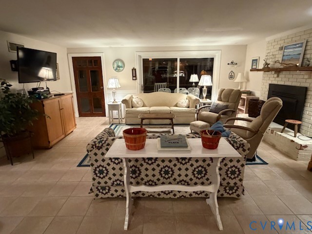 1280 Little Florida Road Farnham, VA 22460 - Photo 21 of 72 a living room with furniture fireplace and a flat screen tv