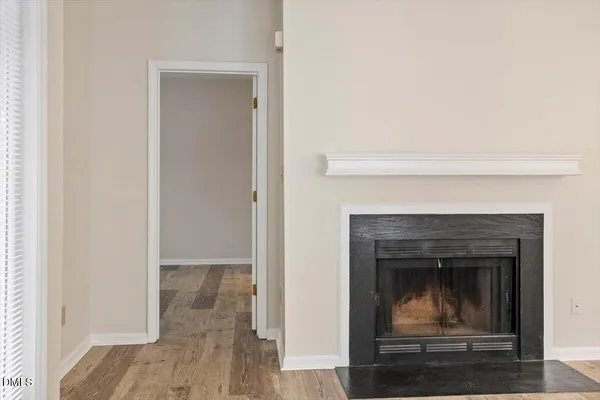 a living room with a fireplace