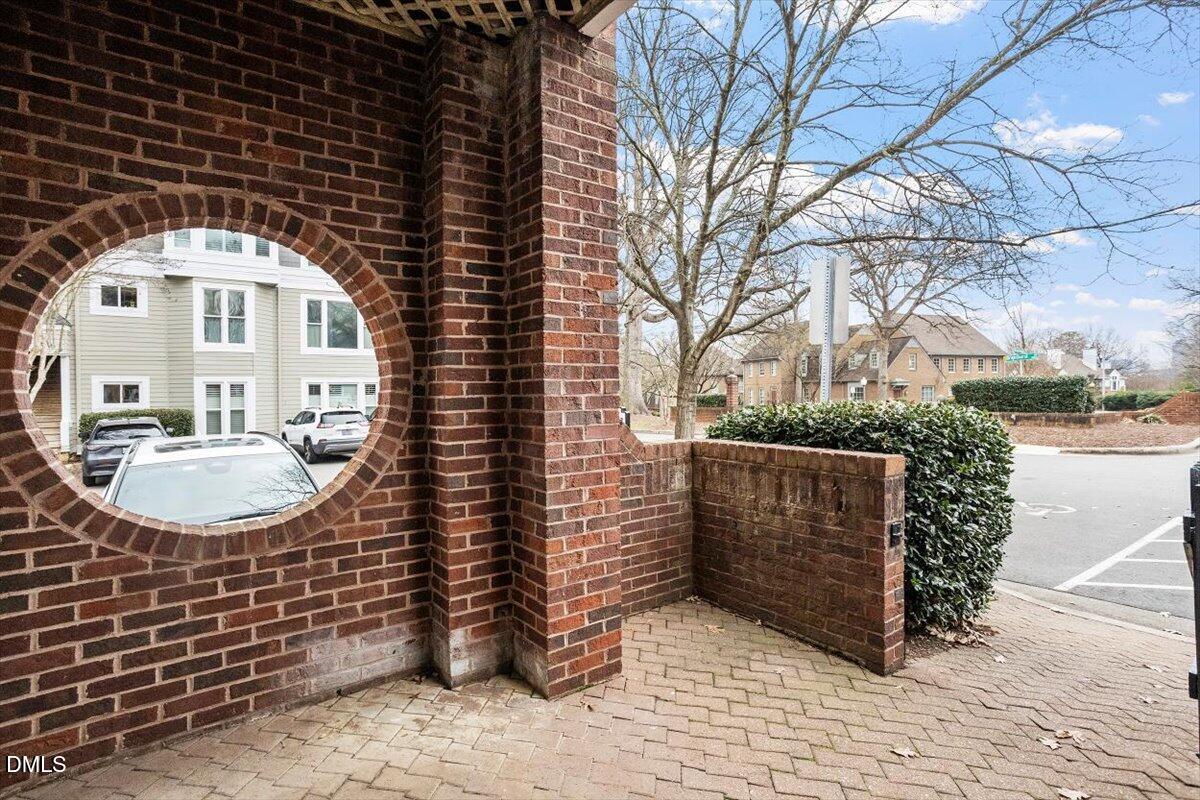 1001 Brighthurst Drive, Unit 106 Raleigh, NC 27605 - Photo 2 of 23 a view of a entrance gate of a house