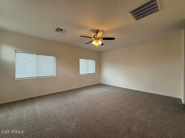 a bathroom with a double vanity sink and mirror