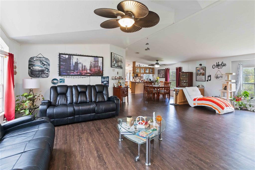6701 Nova Road St. Cloud, FL 34771 - Photo 17 of 49 a living room with furniture and wooden floor