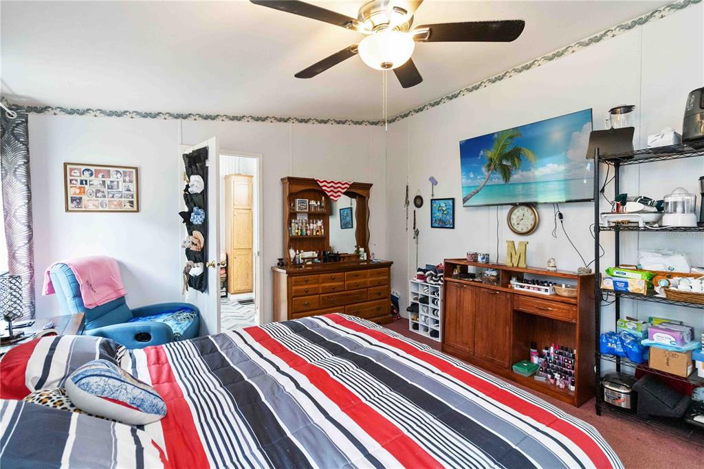 6701 Nova Road St. Cloud, FL 34771 - Photo 26 of 49 a living room with furniture fireplace and flat screen tv