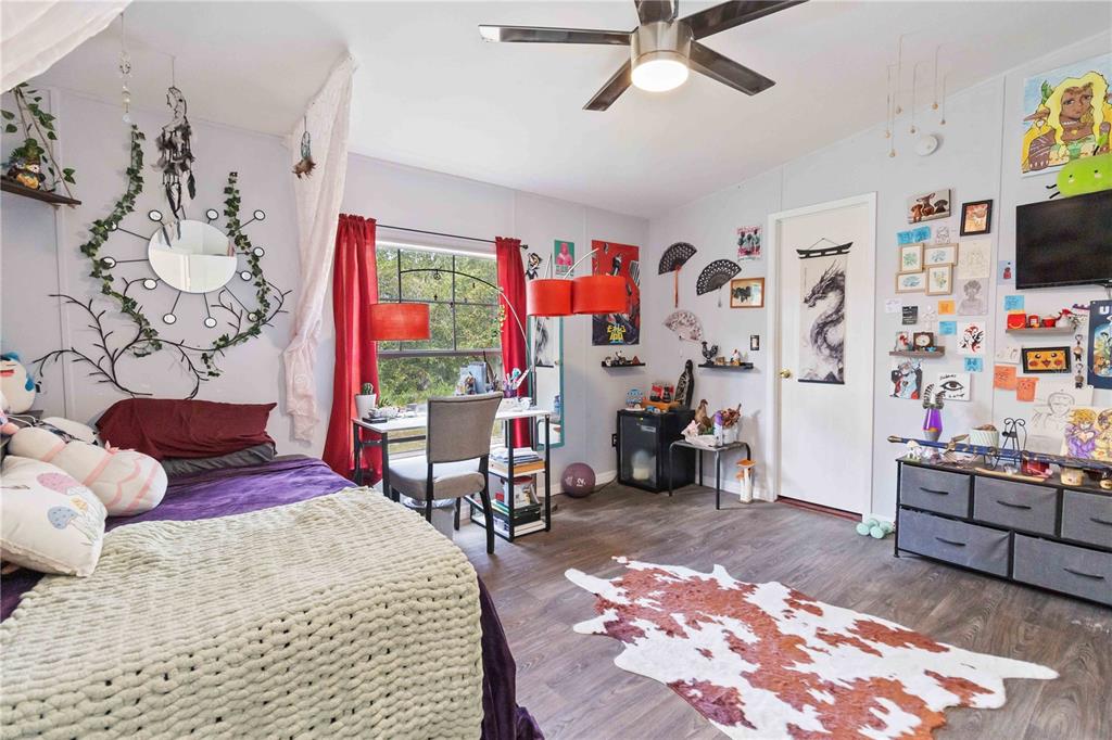 6701 Nova Road St. Cloud, FL 34771 - Photo 32 of 49 a bedroom with a bed and a window