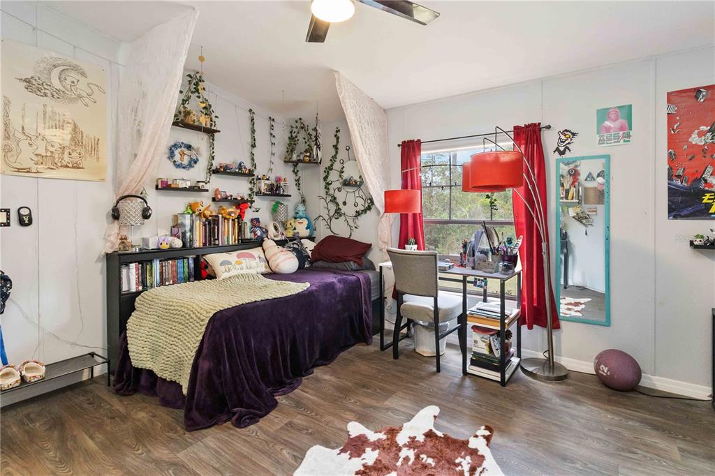 6701 Nova Road St. Cloud, FL 34771 - Photo 33 of 49 a bedroom with bed and a window