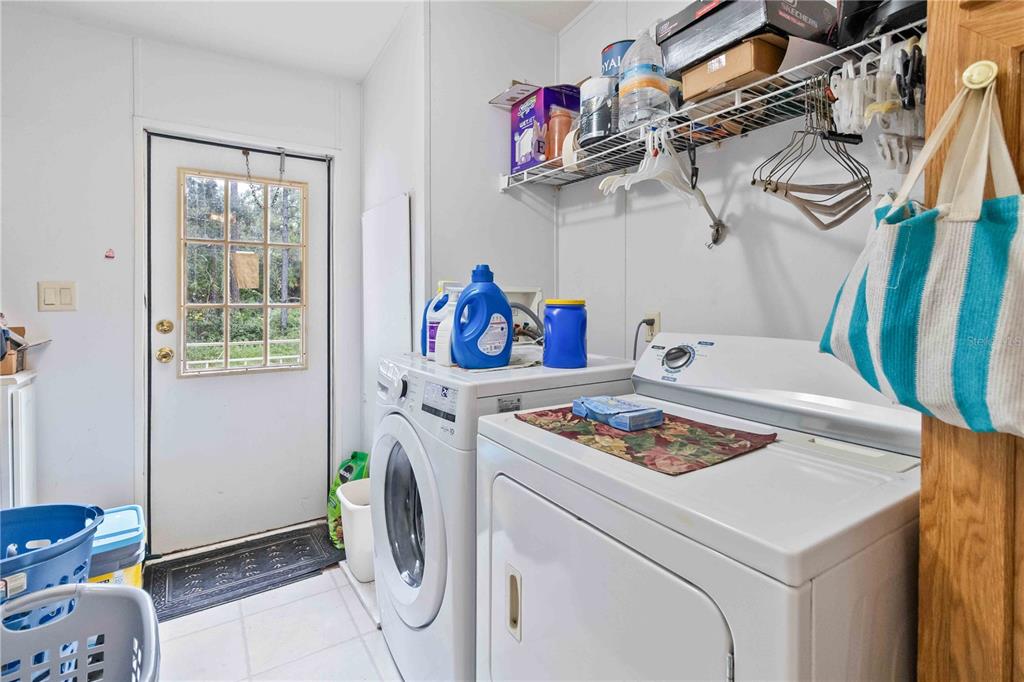 6701 Nova Road St. Cloud, FL 34771 - Photo 34 of 49 a utility room with dryer and washer