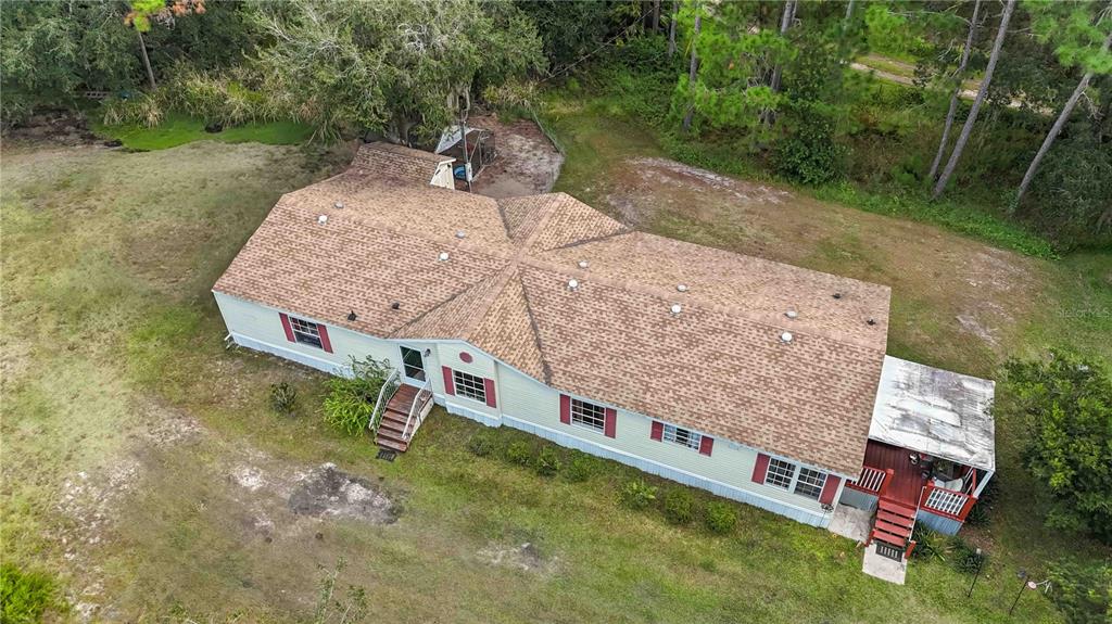 6701 Nova Road St. Cloud, FL 34771 - Photo 39 of 49 an aerial view of a house with backyard