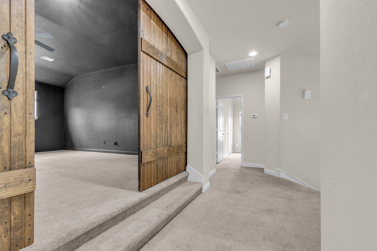 2739 Barrington Branch Drive Spring, TX 77373 - Photo 28 of 41 Media room with barn doors