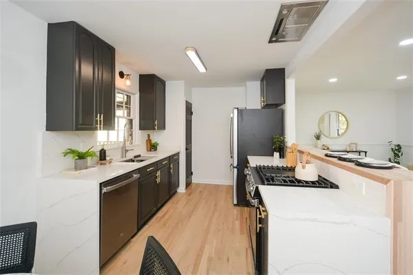 a living room with furniture fireplace and window