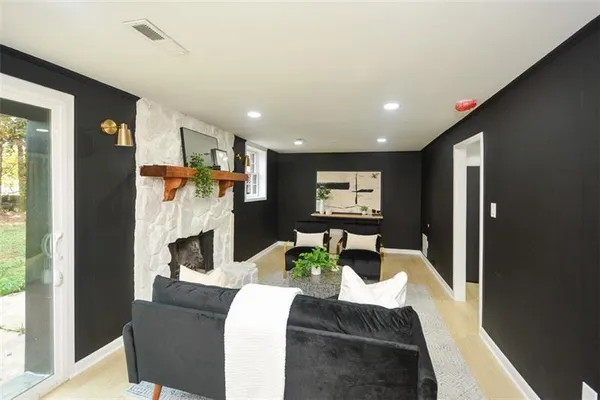 a bathroom with double vanity sinks and a mirror