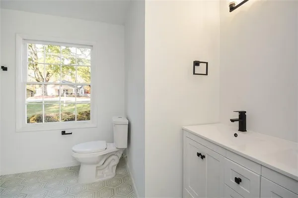 a view of a backyard with a garden and plants