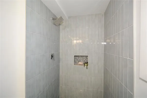 an aerial view of a house with garden space and street view