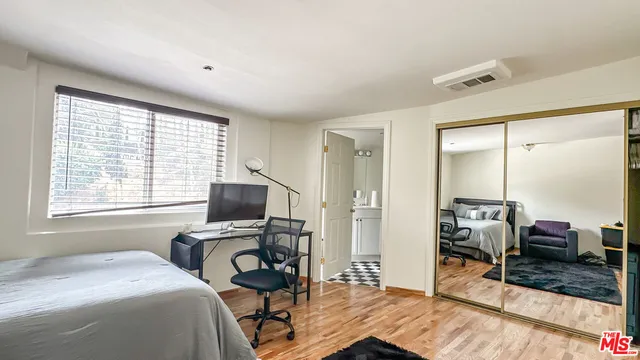 a view of a chairs and table in the patio