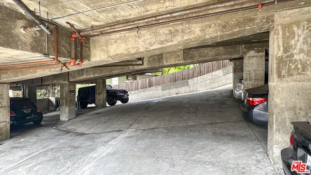 a view of swimming pool from a balcony