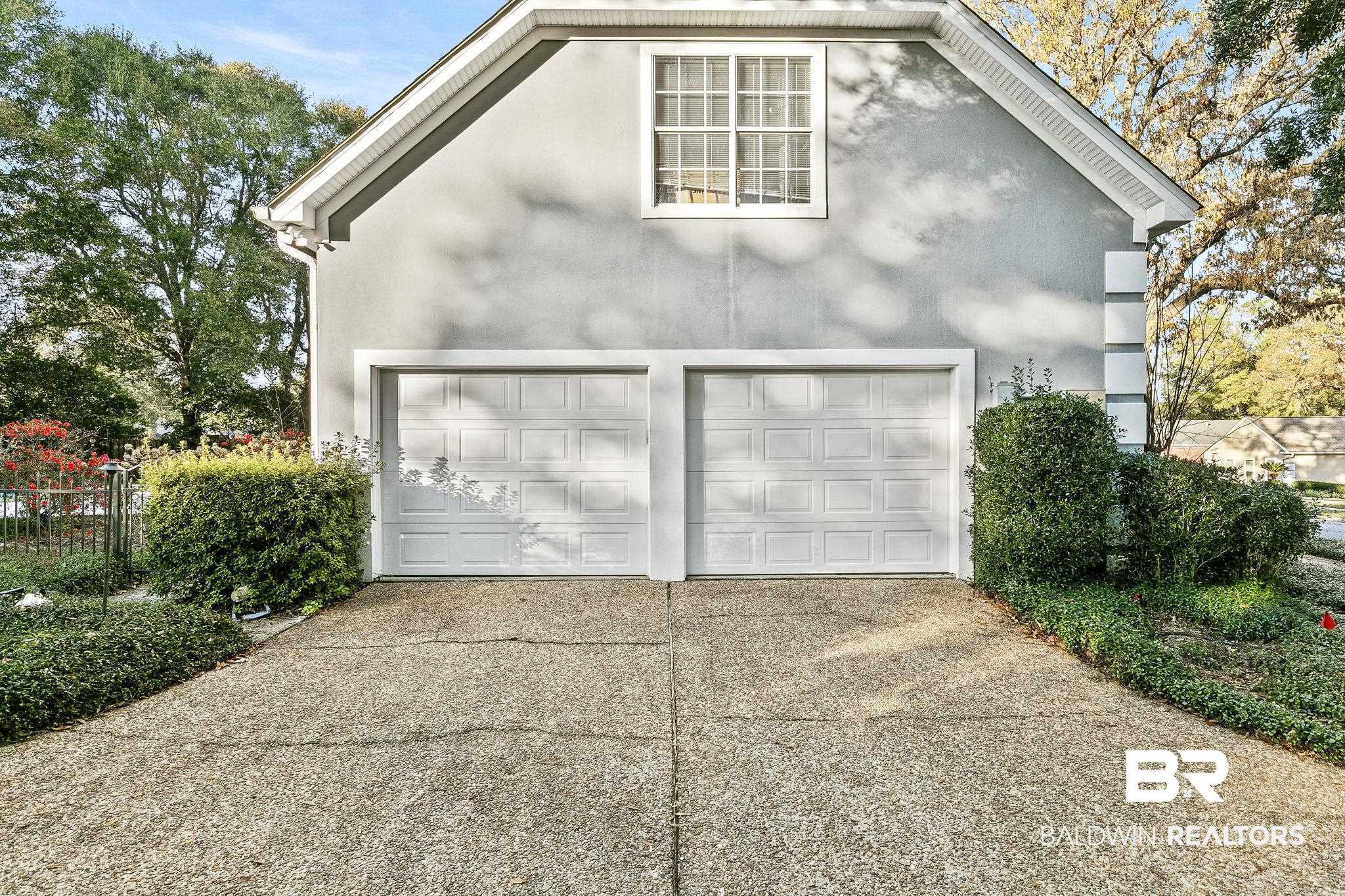 2100 Stonebrook Drive West Mobile, AL 36695 - Photo 8 of 60 Exterior space featuring a garage