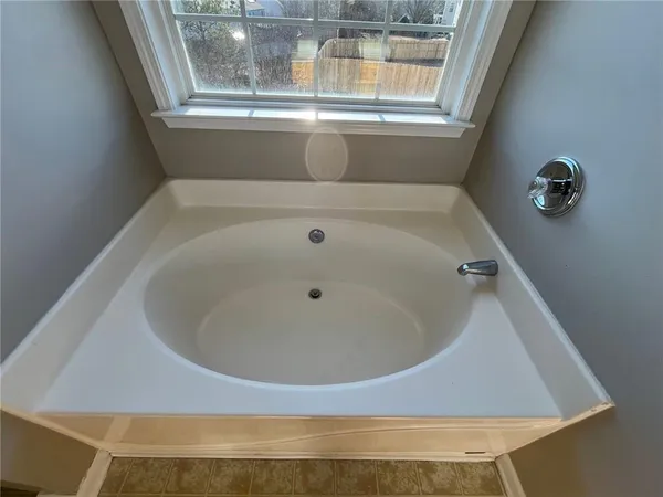 a bathroom with a bathtub