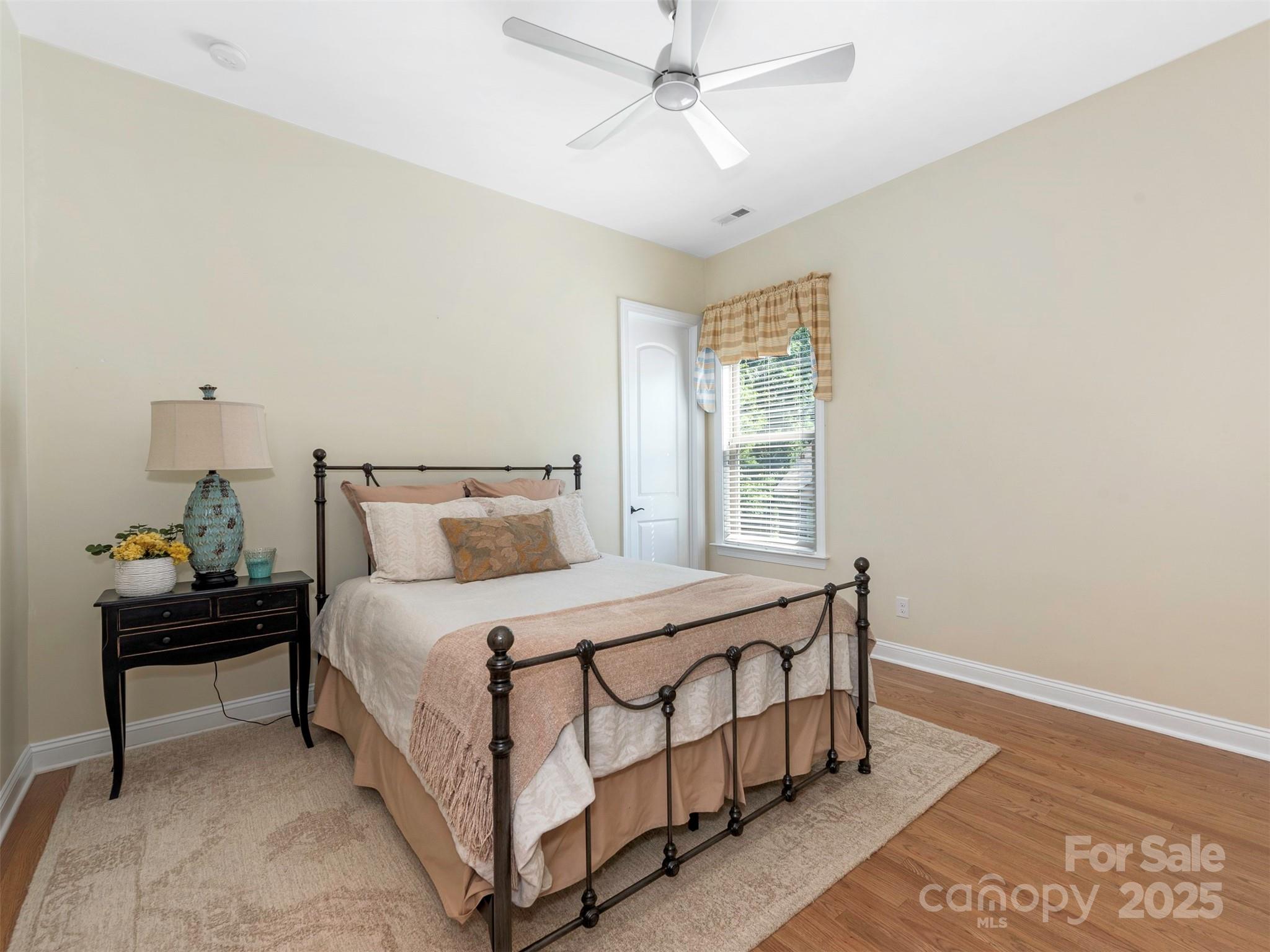 8062 Clems Branch Road Indian Land, SC 29707 - Photo 6 of 42 a bedroom with a bed and a window