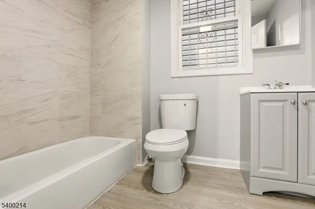 a view of a house with a street