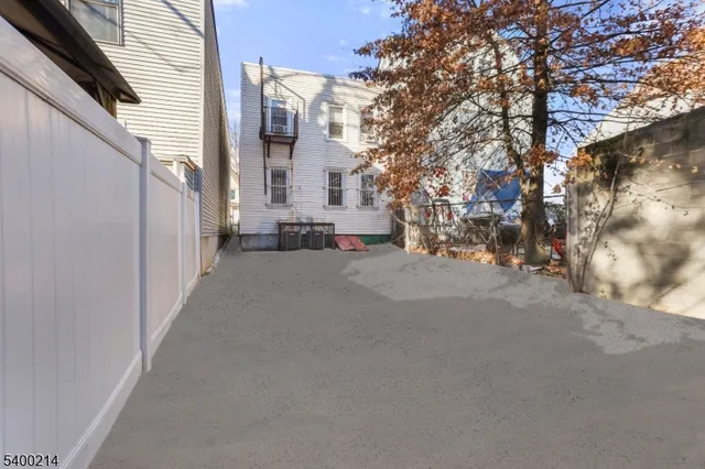 a view of a backyard with a garden