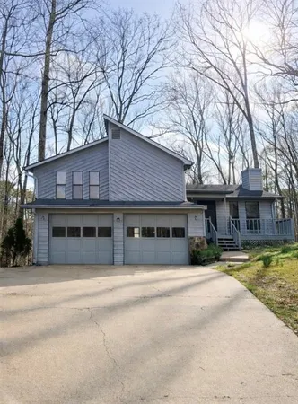 a house with trees in front of it