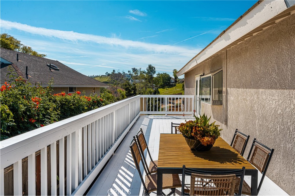 14312 Martin Riverside, CA 92503 - Photo 23 of 58 a view of balcony with furniture and wooden deck