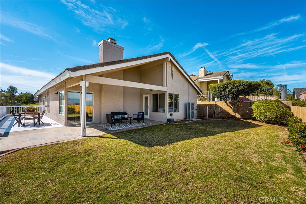 14312 Martin Riverside, CA 92503 - Photo 30 of 58 a view of a house with backyard porch and sitting area