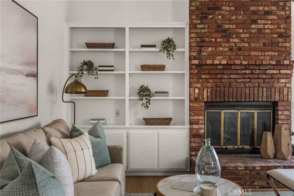 14312 Martin Riverside, CA 92503 - Photo 35 of 58 a living room with furniture cabinets and a table