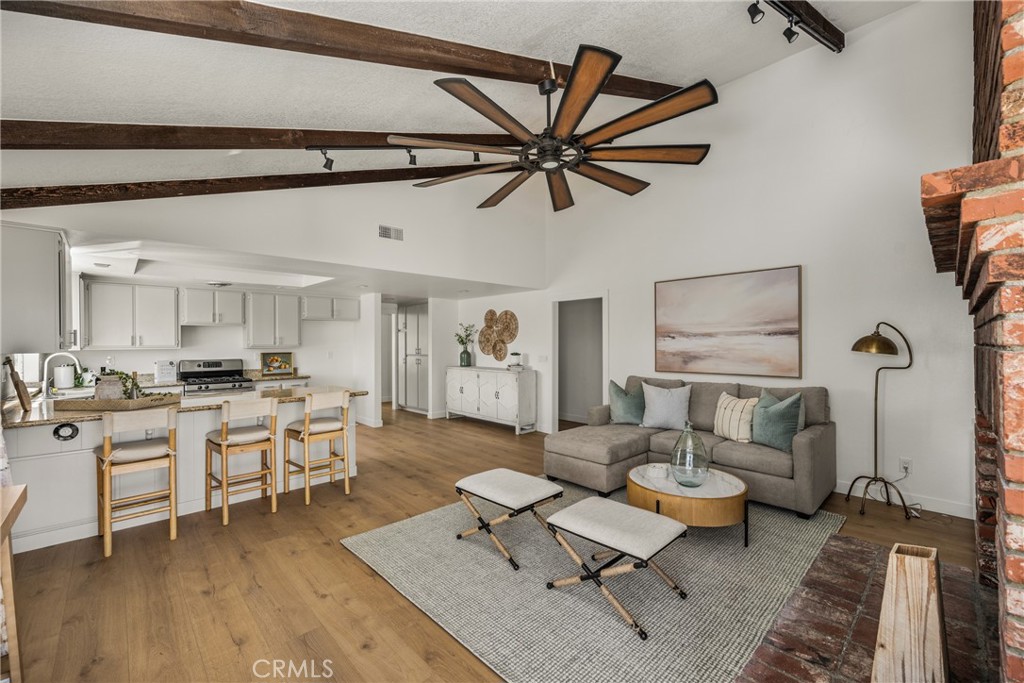 14312 Martin Riverside, CA 92503 - Photo 37 of 58 a living room with furniture a rug and a ceiling fan