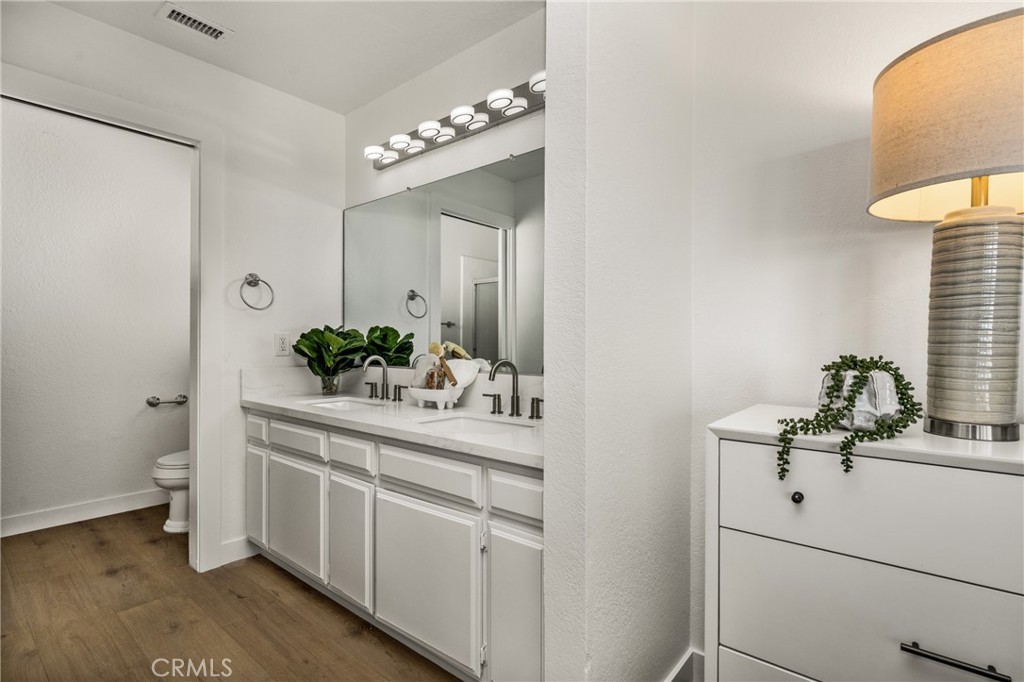 14312 Martin Riverside, CA 92503 - Photo 46 of 58 a bathroom with a sink and a mirror