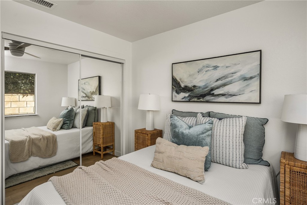 14312 Martin Riverside, CA 92503 - Photo 57 of 58 a bedroom with a bed and a painting on the wall